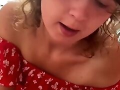 '18 year old British babe gives long blowjob and swallows cum from big white cock in pretty red dress'
