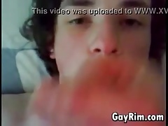 young guy tastes the cum